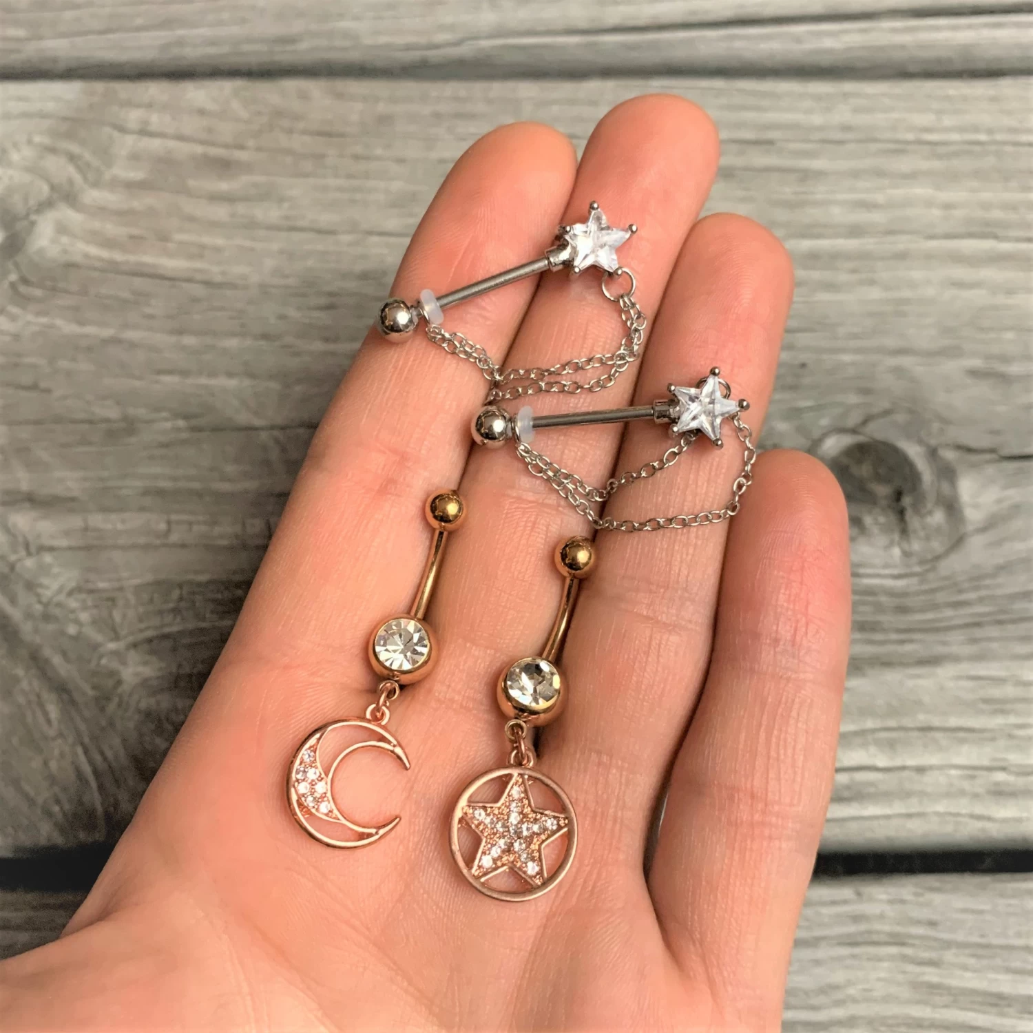 Gaby 14 Gauge 5/8 Clear CZ Star Gem Chain Dangle Nipple Ring Set 2 Gaby 14 Gauge 5/8 Clear CZ Star Gem Chain Dangle Nipple Ring Set - Image 2