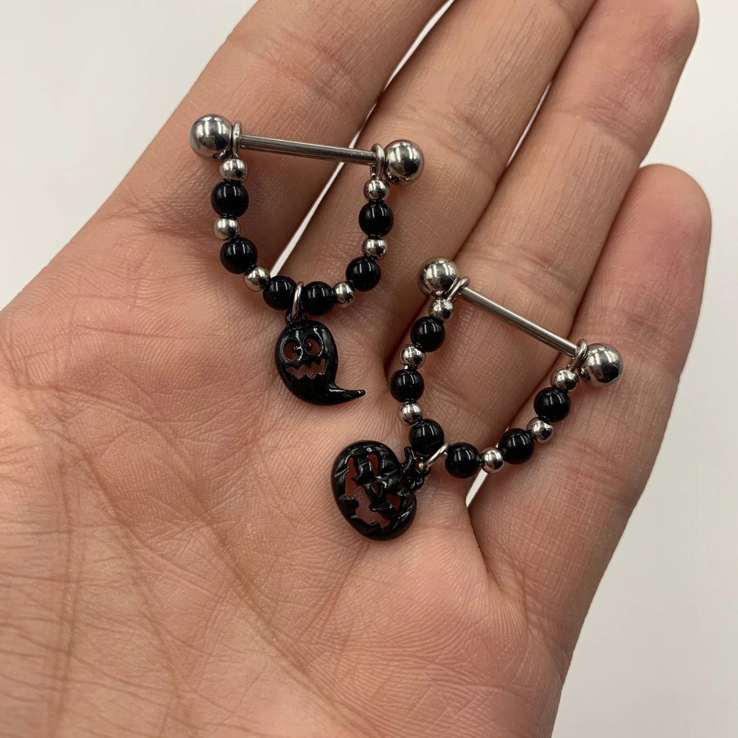 Gaby 14 Gauge 5/8 Black Pumpkin Ghost Halloween Dangle Nipple Ring Set 2 Gaby 14 Gauge 5/8 Black Pumpkin Ghost Halloween Dangle Nipple Ring Set - Image 2
