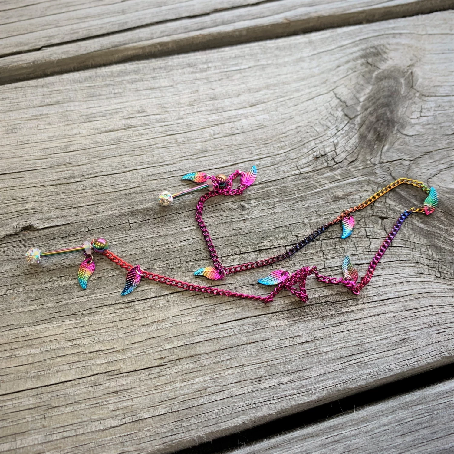 Gaby 14 Gauge 5/8 Clear Gem Rainbow Autumn Leaves Dangle Nipple Chain 2 Gaby 14 Gauge 5/8 Clear Gem Rainbow Autumn Leaves Dangle Nipple Chain - Image 2