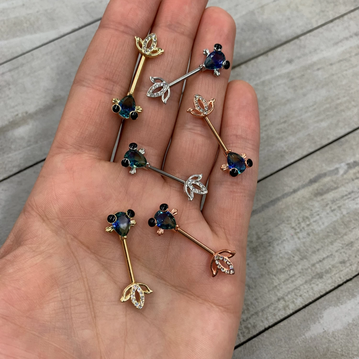 Gaby 14 Gauge 9/16 Aqua Gem Rose Gold Tone Fish Barbell Nipple Ring Set 2 Gaby 14 Gauge 9/16 Aqua Gem Rose Gold Tone Fish Barbell Nipple Ring Set - Image 2