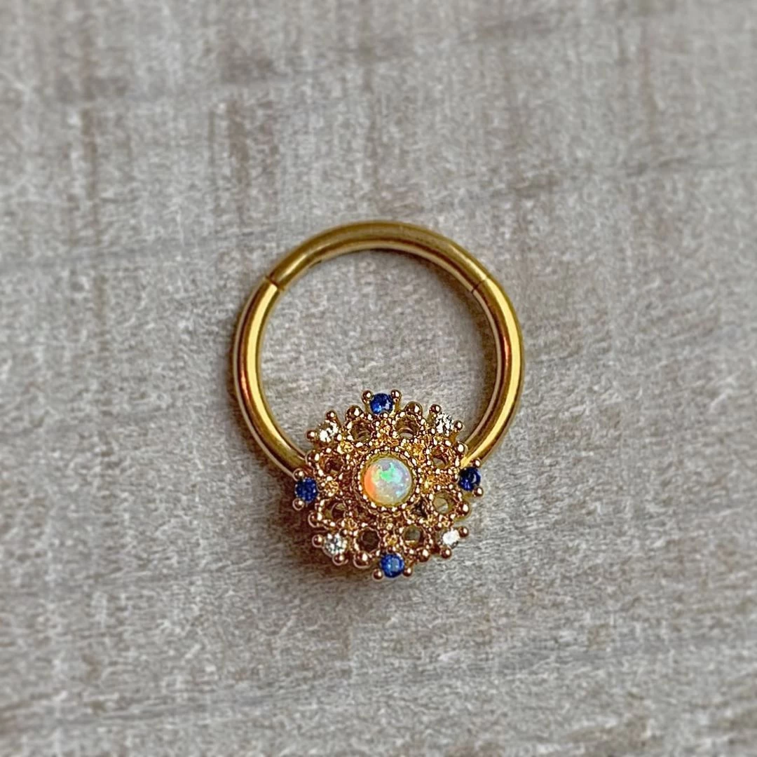 16 Gauge 3/8 Gold Tone White Synthetic Opal Sun Hinged Segment Ring 2 16 Gauge 3/8 Gold Tone White Synthetic Opal Sun Hinged Segment Ring - Image 2