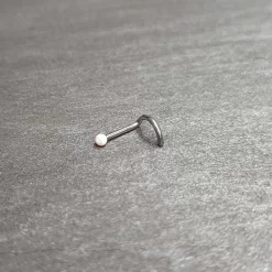 18 Gauge 1/4 White Synth Opal G23 Titanium Threadless Left Nose Screw 18 18 Gauge 1/4 White Synth Opal G23 Titanium Threadless Left Nose Screw -Body Jewelry Store 75189.otherimage3