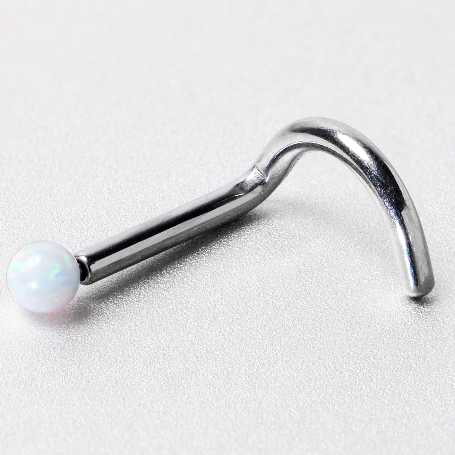 18 Gauge 1/4 White Synth Opal G23 Titanium Threadless Left Nose Screw 6 18 Gauge 1/4 White Synth Opal G23 Titanium Threadless Left Nose Screw - Image 6