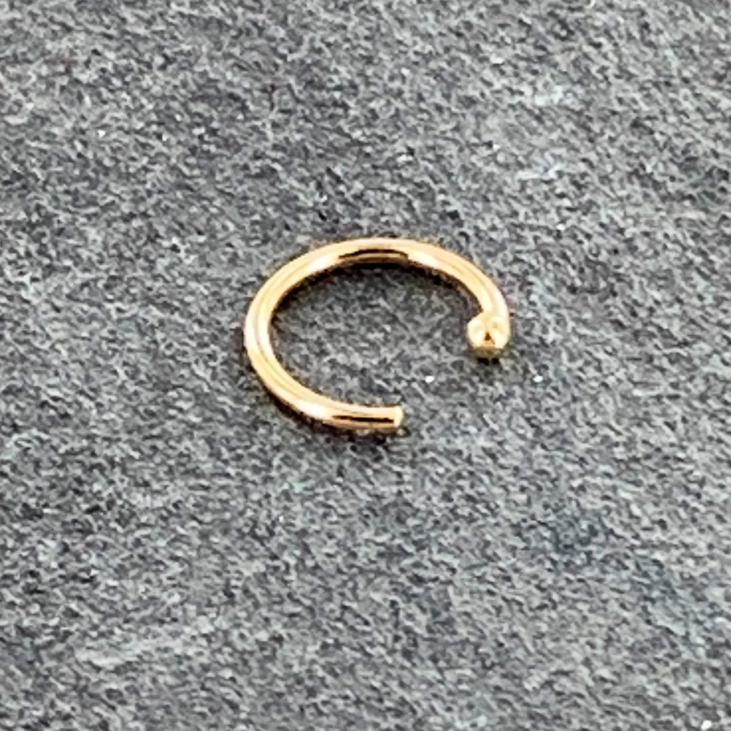 20 Gauge 1/4 14kt Solid Yellow Gold Nose Hoop 6 20 Gauge 1/4 14kt Solid Yellow Gold Nose Hoop - Image 6